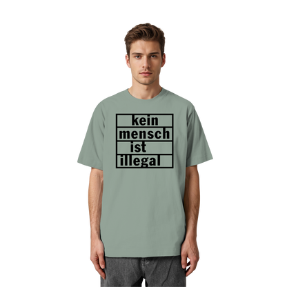 Kein Mensch ist illegal (Schwarz) - Oversized T-Shirt